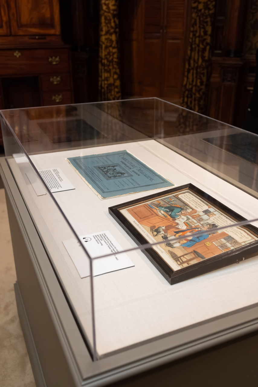 Installation view featuring the Caricature Magazine